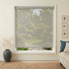 Load image into Gallery viewer, Sleek Premier 14% Solar Screen Roller Shade illuminates a sun-drenched living room with refined elegance, filtering UV rays while maintaining 14% openness.
