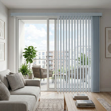 Load image into Gallery viewer, Natural sunlight hits the White S Shape Pvc Vertical Blinds in a relaxed retreat, adding a refined, undulating texture to the window treatment.
