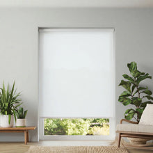 Load image into Gallery viewer, A bright and airy room featuring White Signature light filtering shades that maintain privacy while letting in light.
