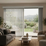 Woodtone faux wood PVC vertical blinds seamlessly blend with the crisp white surroundings, creating a harmonious atmosphere in this inviting living room.