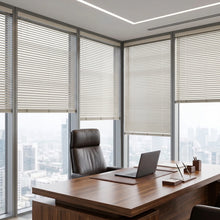Load image into Gallery viewer, Showcasing White (Yellow White) Classic Cordless 6g Aluminum Mini Blinds in a cozy living room, delivering durable privacy with a modern metallic profile.
